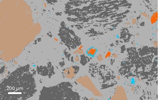 Artificial color map following Intellesis classification. Despite the challenges presented by sample preparation, e.g., the impossibility of obtaining a transmitted light image, surface scratches, and gauges, Intellesis automatically classifies the individual constituents of this image. Resin in light grey, gangue in dark grey, pyrite in brown, chalcopyrite in orange, and chalcocite in blue.