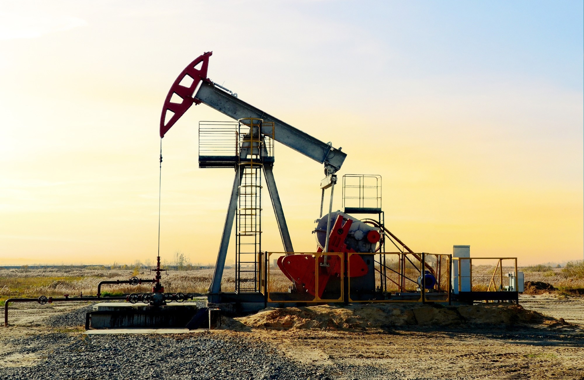 oilfield with sunset behind