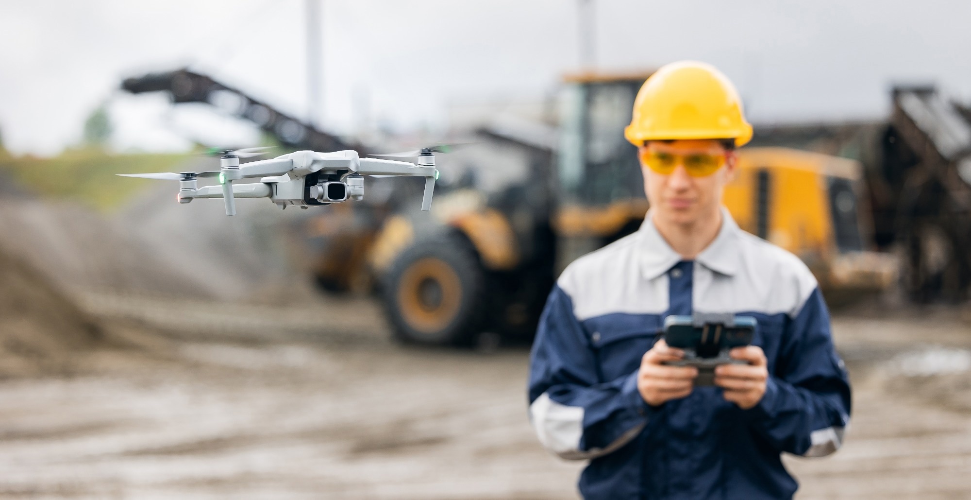 mining personnel uses drone to conduct remote mining