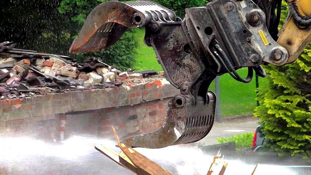 picture of digger and old bricks, urban mining