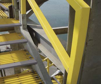 Strongwell’s 2 inch, square, SAFRAIL™ industrial handrail and DURADEK® fiberglass grating