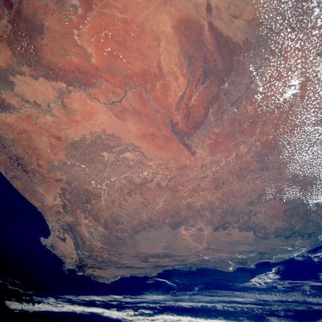 The reddish-brown Kalahari Desert.