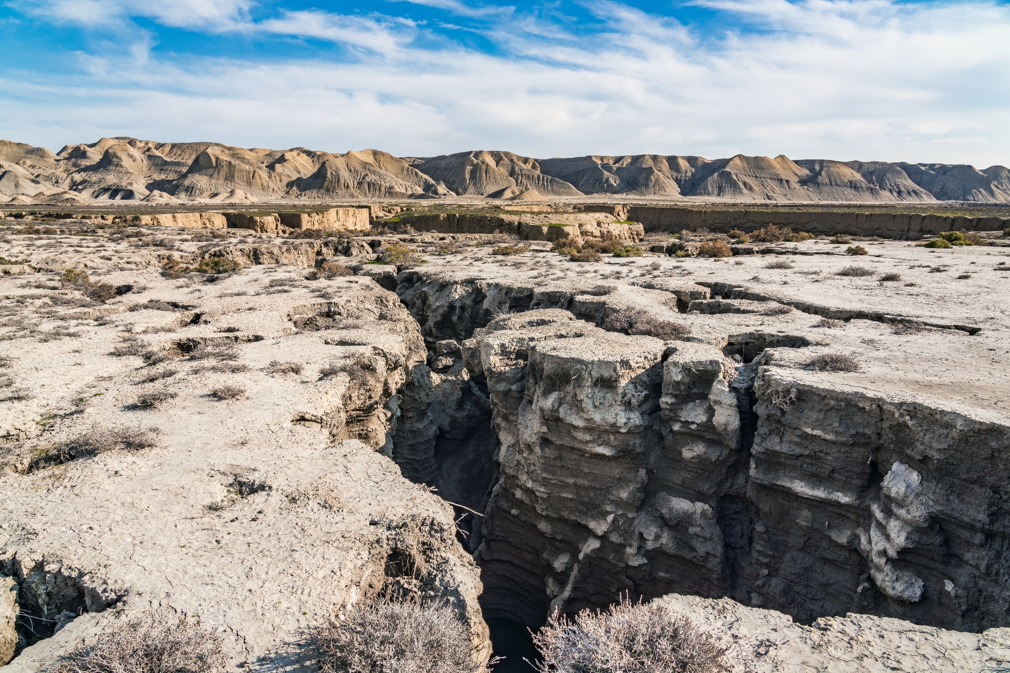 Slab Hydration Controls Aftershock Productivity in Subduction Zones