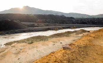 Novel Grouting Method Prevents Water-Sand Inrushes in Mining