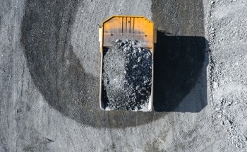 How Mining-Induced Stress Redistribution Activates Geological Faults