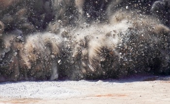 Seismic Velocity Tomography Predicts Mining-Induced Rockburst Risks